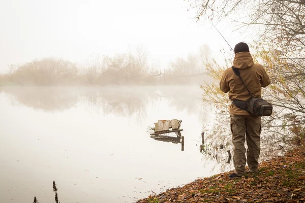 Fisherman with spinning — Stock Photo, Image