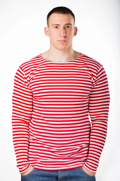 Muscular man in a striped clothes — Stock Photo, Image