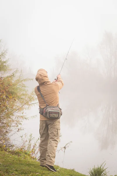 Male Fisherman with spinning — Stock Photo, Image