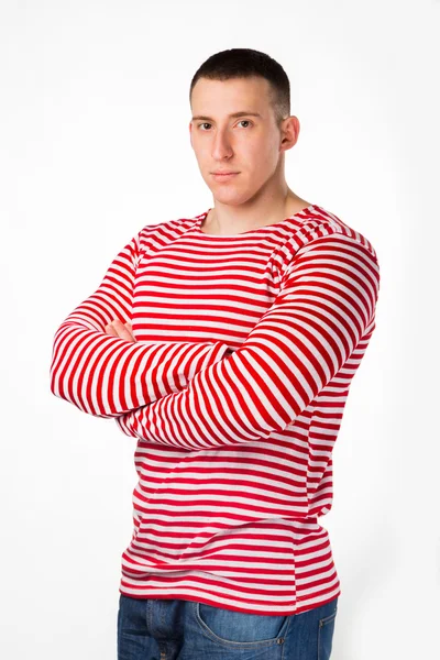 Muscular man in a striped clothes — Stock Photo, Image