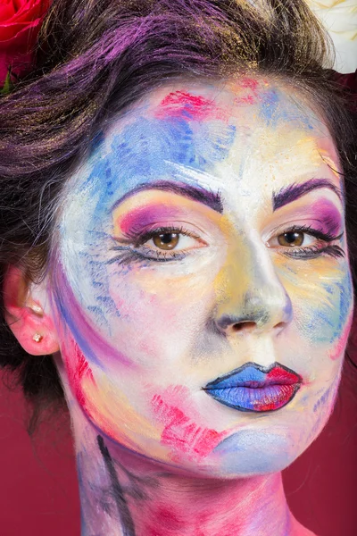 Modelo com maquiagem colorida — Fotografia de Stock