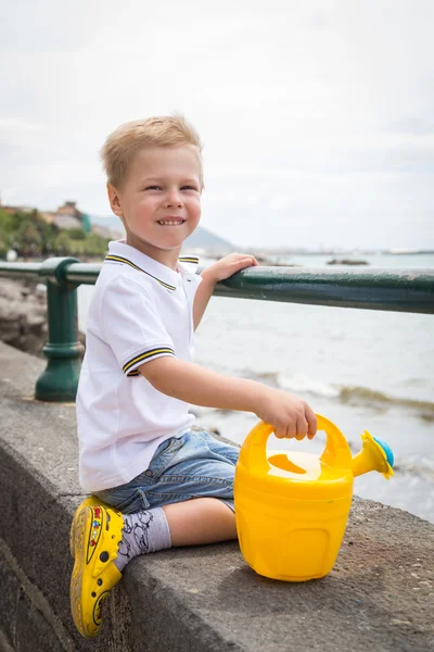 Boy on sea promenade — Stock Photo, Image