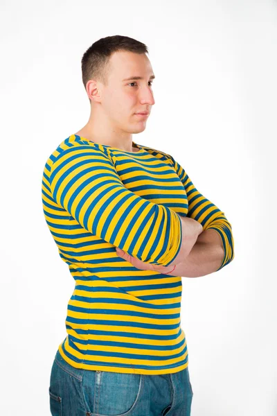 Muscular man in a striped clothes — Stock Photo, Image