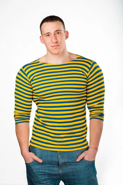 Muscular man in a striped clothes — Stock Photo, Image