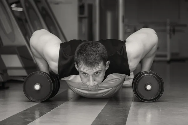 Man doing exercise with dumbbells — Stock Photo, Image