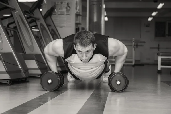 Man doing exercise with dumbbells — Stock Photo, Image