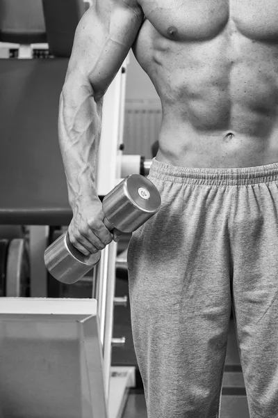 Man working out with weights — Stock Photo, Image