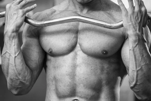 Man working out with weights — Stock Photo, Image