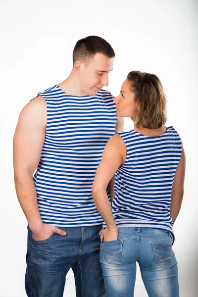 Homem e mulher atléticos em colete listrado — Fotografia de Stock