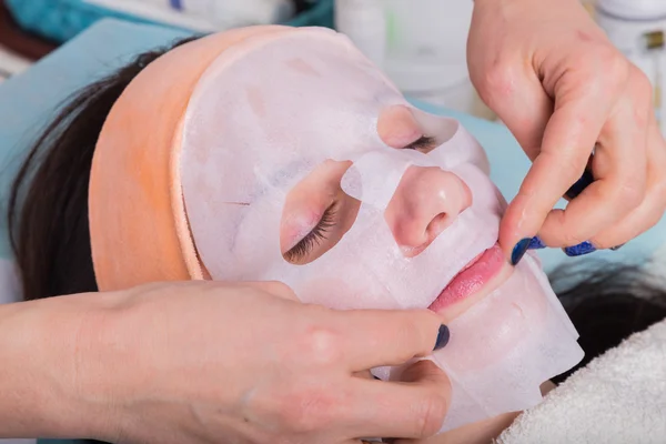 Girl with a beautician at spa salon. — Stock Photo, Image