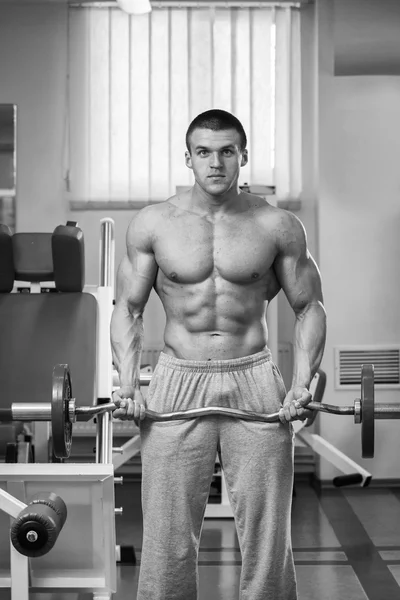 Man holding dumbbell. — Stock Photo, Image