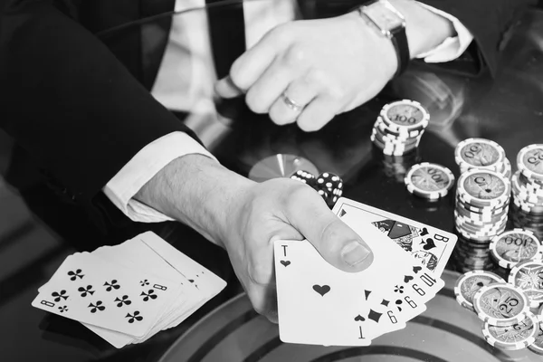 Poker player in the casino — Stock Photo, Image