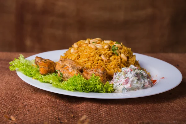 Rice with meat and vegetables — Stock Photo, Image