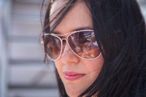 Brunette woman on a yacht sailing — Stock Photo, Image