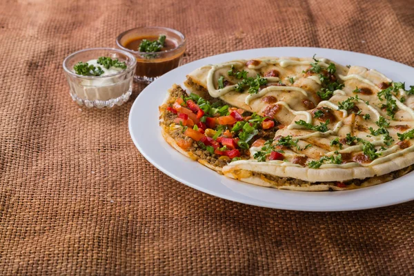 Pita bread with vegetables and meat