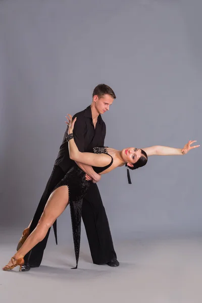 Ballroom dancers in dancing poses