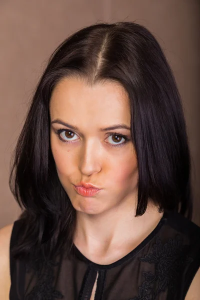 Beautiful woman in black dress — Stock Photo, Image