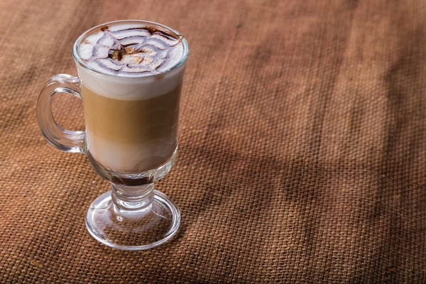 A cup of coffee on the table — Stock Photo, Image