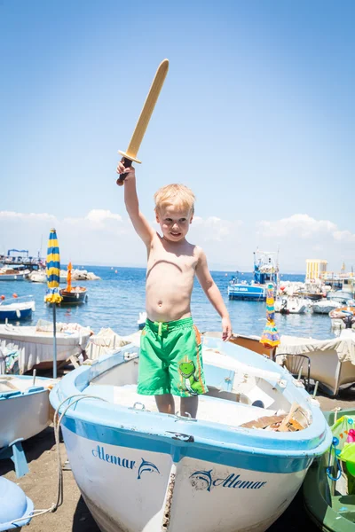 A boy playing on the beach — Stock Photo, Image