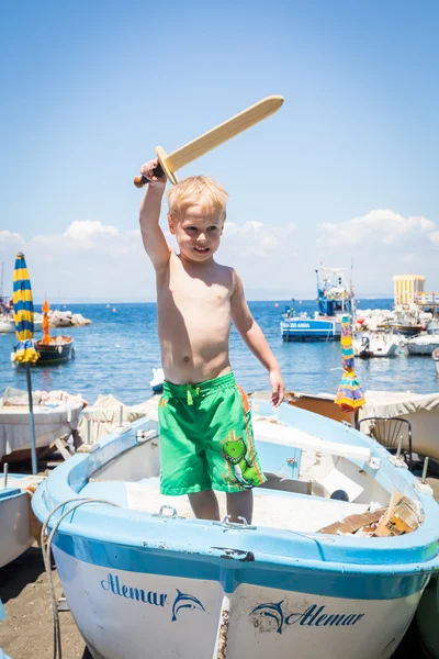 A boy playing on the beach — Stock Photo, Image