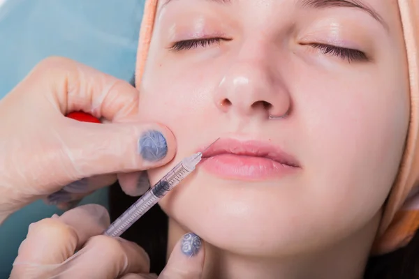 Injection into the patient's face — Stock Photo, Image