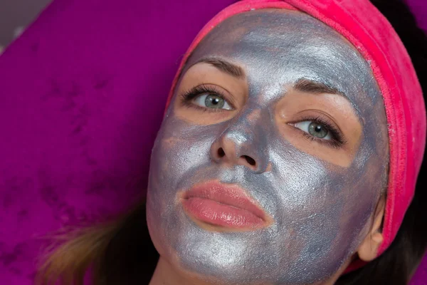 Girl with silver mask on the face — Stock Photo, Image