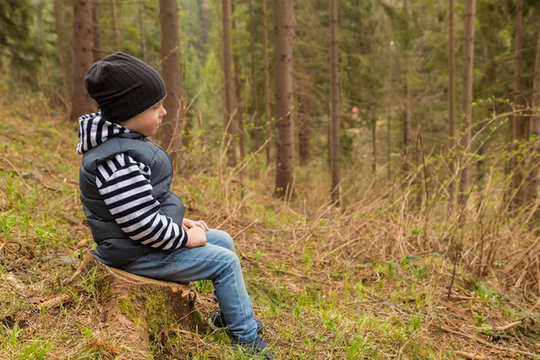 Boy is resting in the forest — Stock Photo, Image