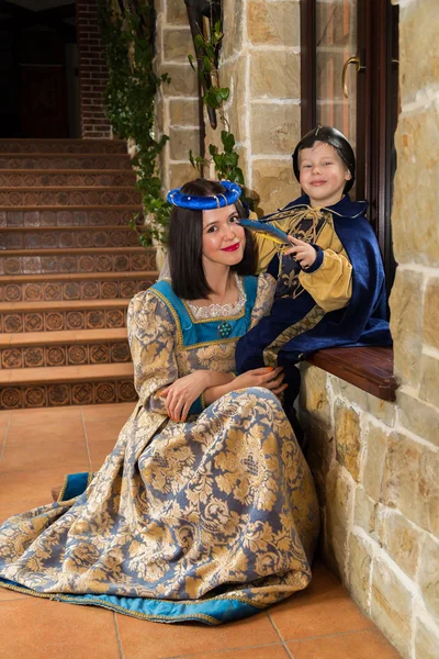 Mother and son in medieval costumes — Stock Photo, Image