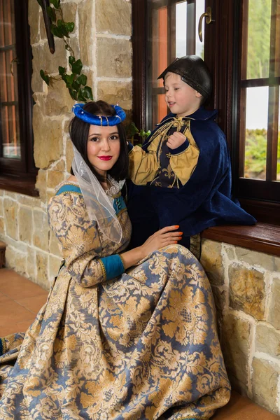 Mother and son in medieval costumes — Stock Photo, Image