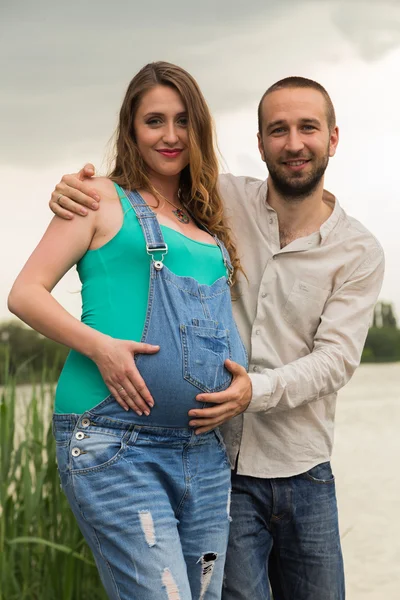 Beautiful family waiting for baby together — Stock Photo, Image