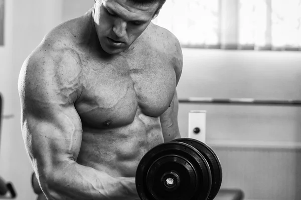 Man exercising with dumbbell — Stock Photo, Image