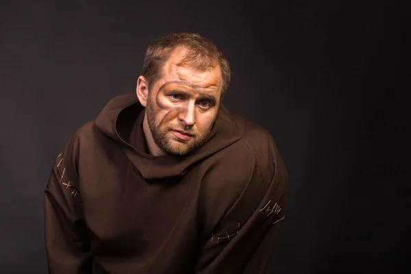 Ein professioneller Schauspieler in Gestalt der Armen — Stockfoto