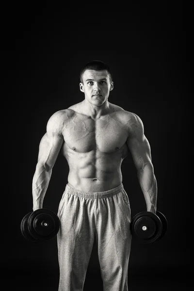 Man exercising with dumbbells — Stock Photo, Image