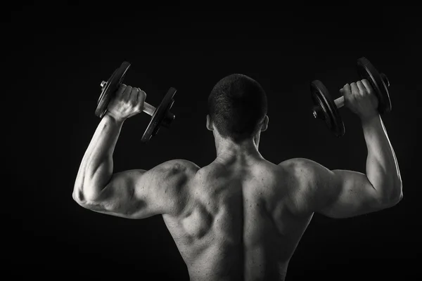 Man exercising with dumbbells — Stock Photo, Image