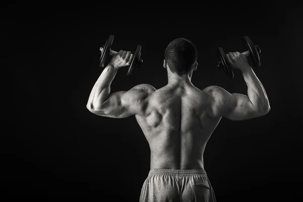 Man exercising with dumbbells — Stock Photo, Image