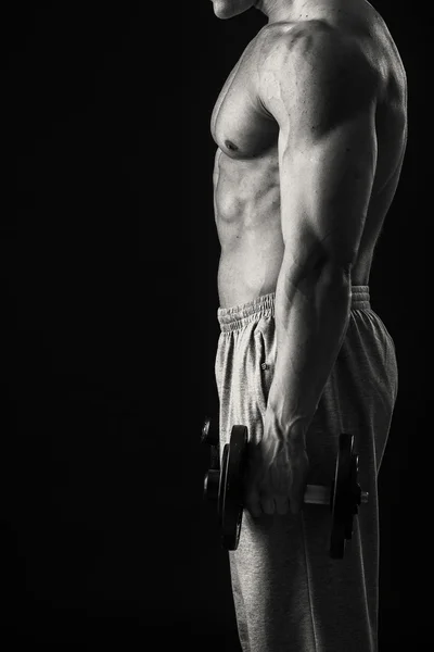 Hombre haciendo ejercicio con pesas —  Fotos de Stock