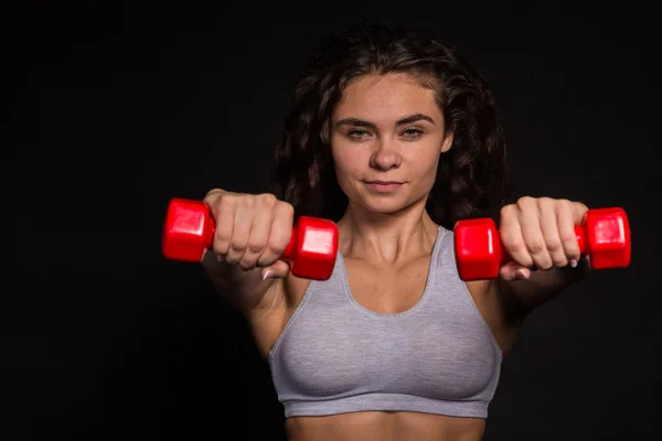 Atletische krullend meisje — Stockfoto