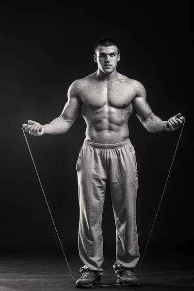 Man holding skipping rope — Stock Photo, Image