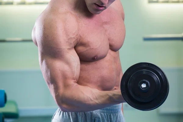 Man exercising with dumbbell — Stock Photo, Image