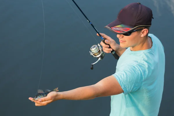 Man caught a fish — Stock Photo, Image