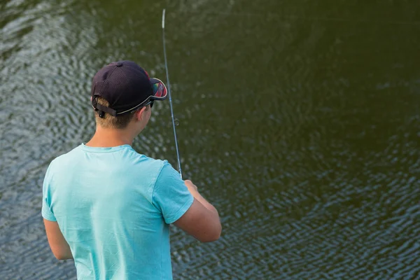 Man caught a fish — Stock Photo, Image