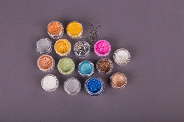 Jars of colorful pigments — Stock Photo, Image