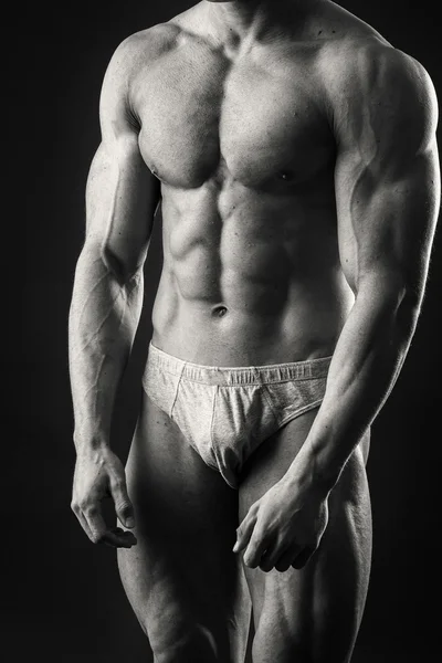 Uomo mostra muscoli — Foto Stock