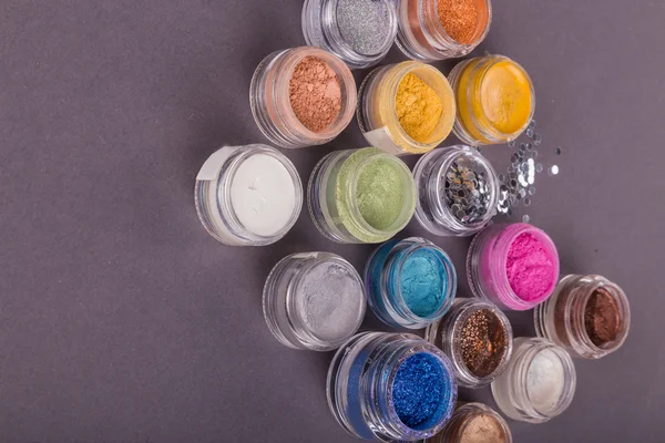 Jars of colorful pigments — Stock Photo, Image
