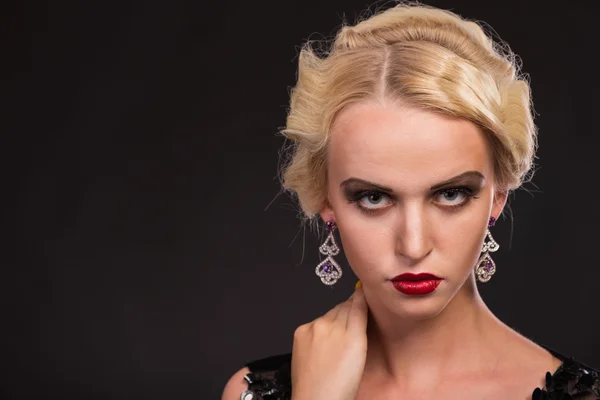 Beautiful blonde with fashion make-up. Royalty Free Stock Photos