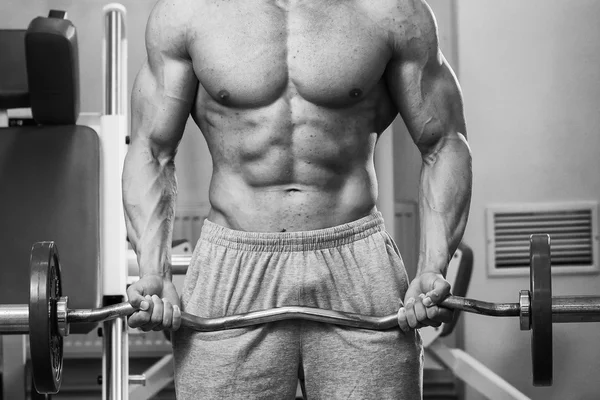 Strength training professional athlete in the gym — Stock Photo, Image