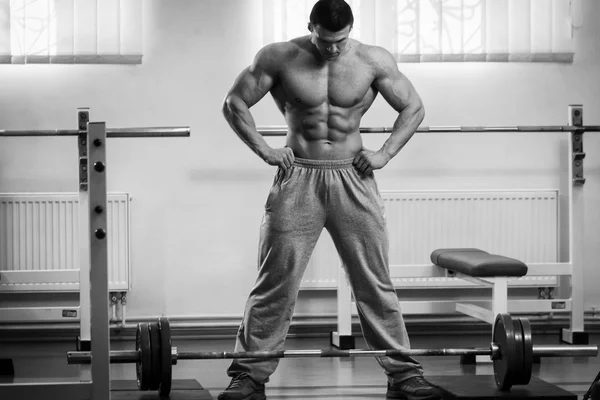 Strength training professional athlete in the gym — Stock Photo, Image