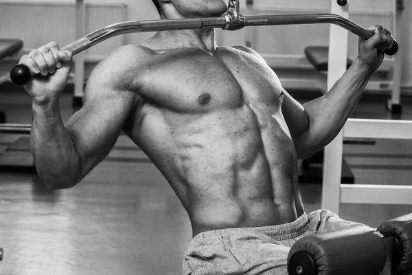 Strength training professional athlete in the gym — Stock Photo, Image