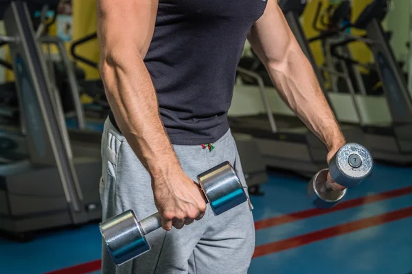Strength training professional athlete in the gym — Stock Photo, Image