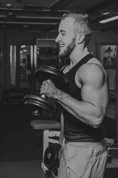 Strength training professional athlete in the gym — Stock Photo, Image